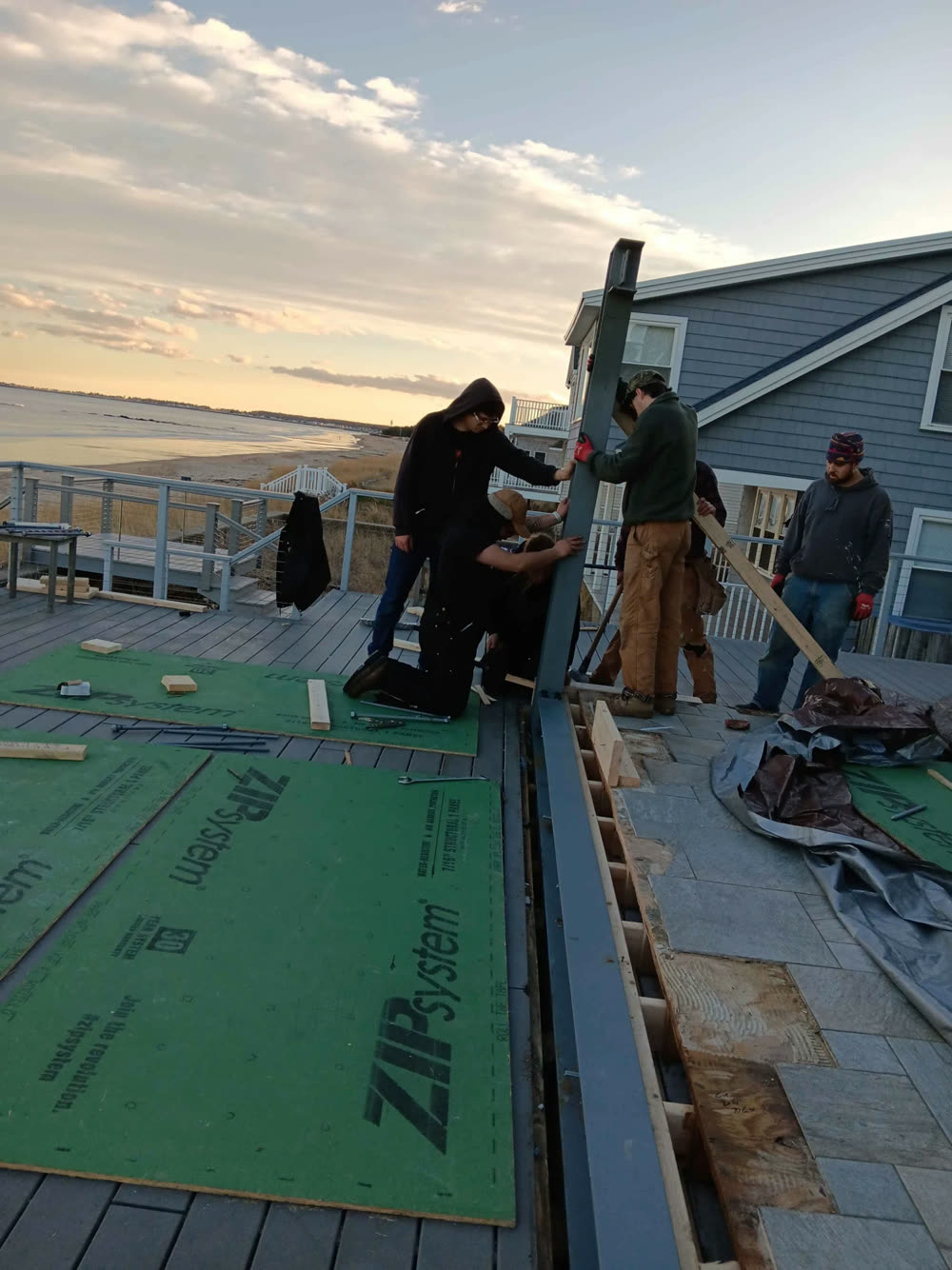 Setting a steel beam by the water