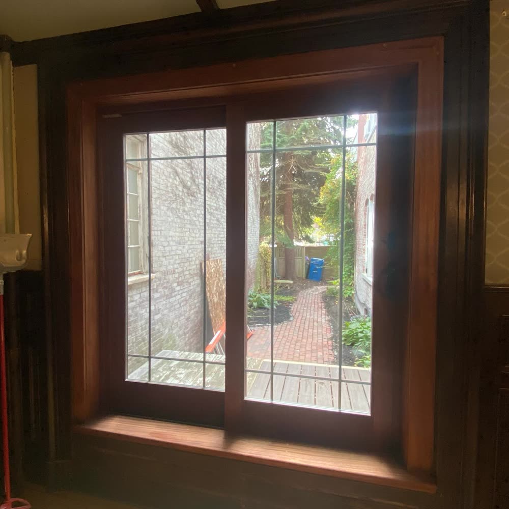 Dark wood window casing in a historic home